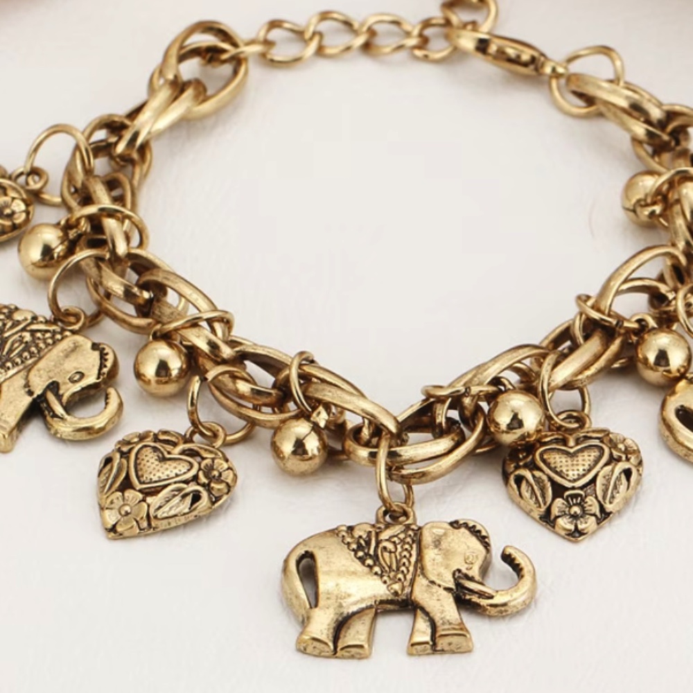 Elephant and heart bracelet - About 7.4 Inches plus 2 inch extender-New-No Tags